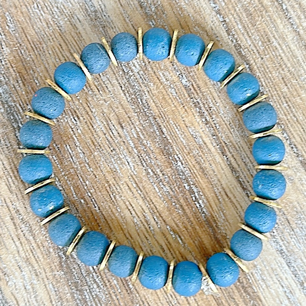 Birch House Jewelry 8mm Blue Lava Rock and gold accent beaded bracelet